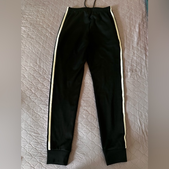 adidas Pants - Black adidas track pants with white stripes